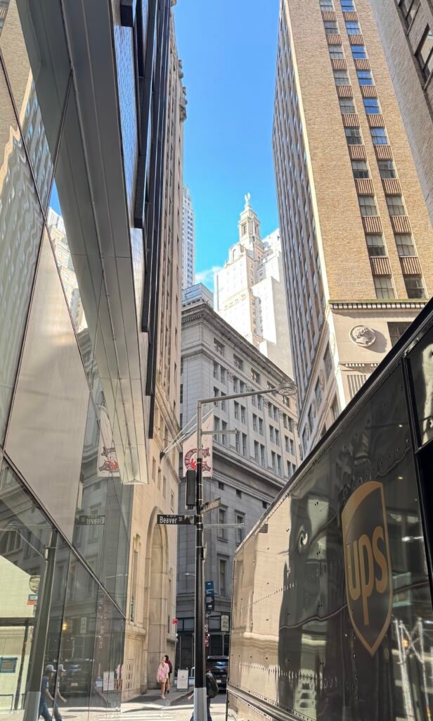 Vertical Format: Narrow street with tall buildings