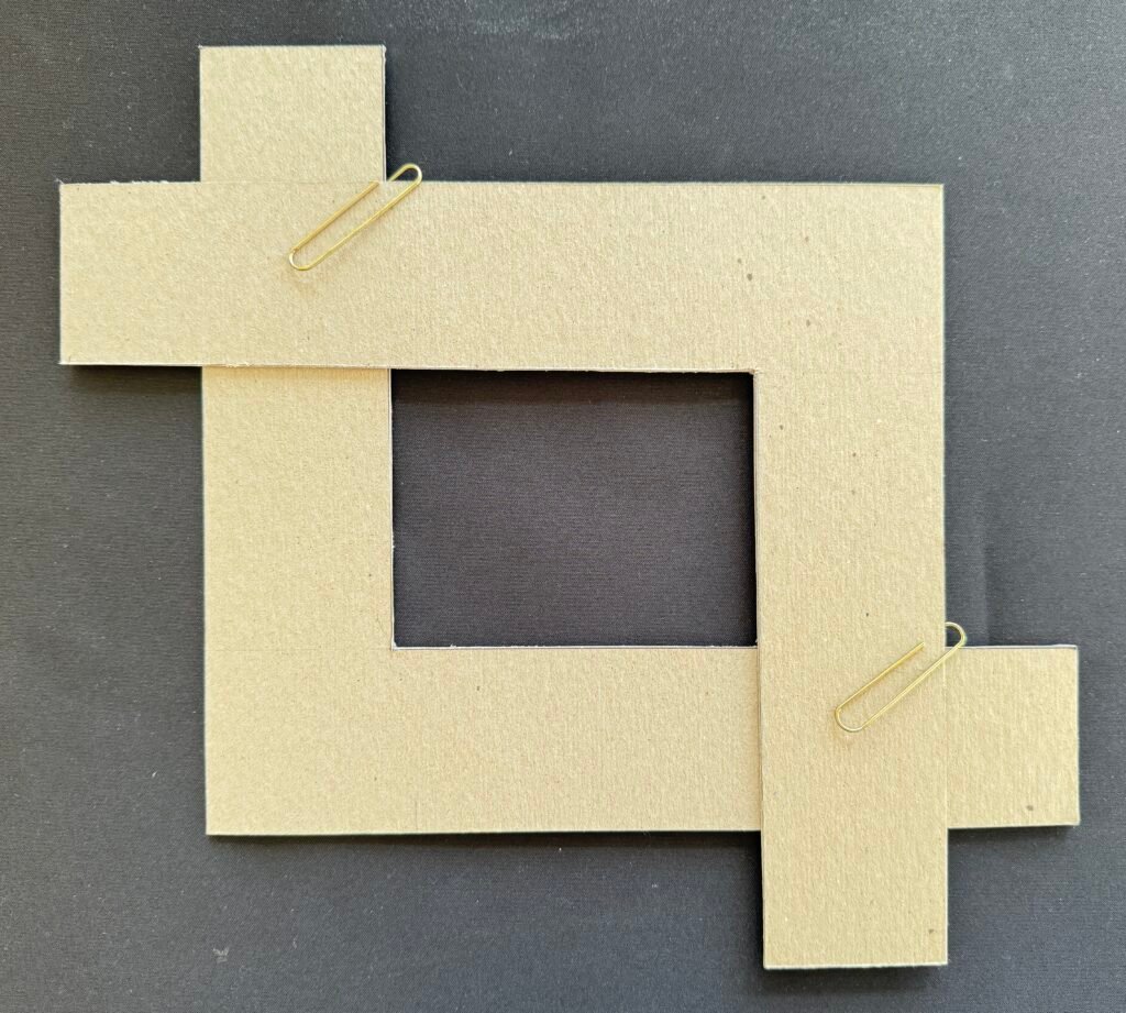 Paper frame with paper clips attached