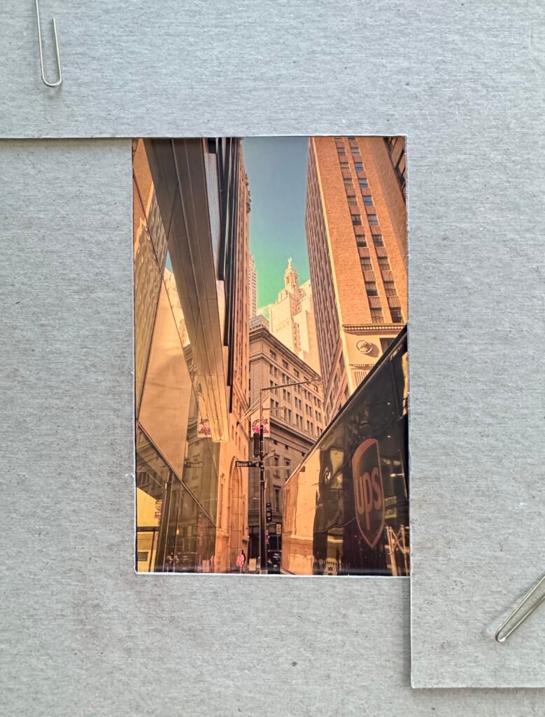 Vertical Format: Urban street with skyscrapers and UPS